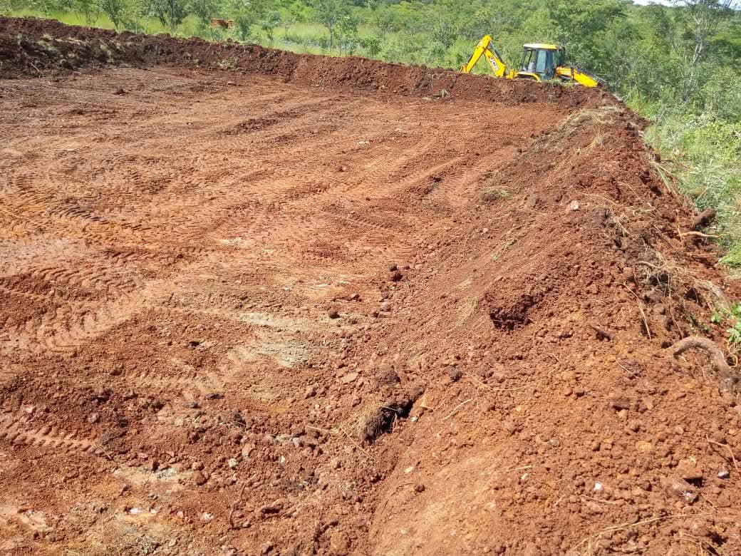 BMR backhoe at an active construction site