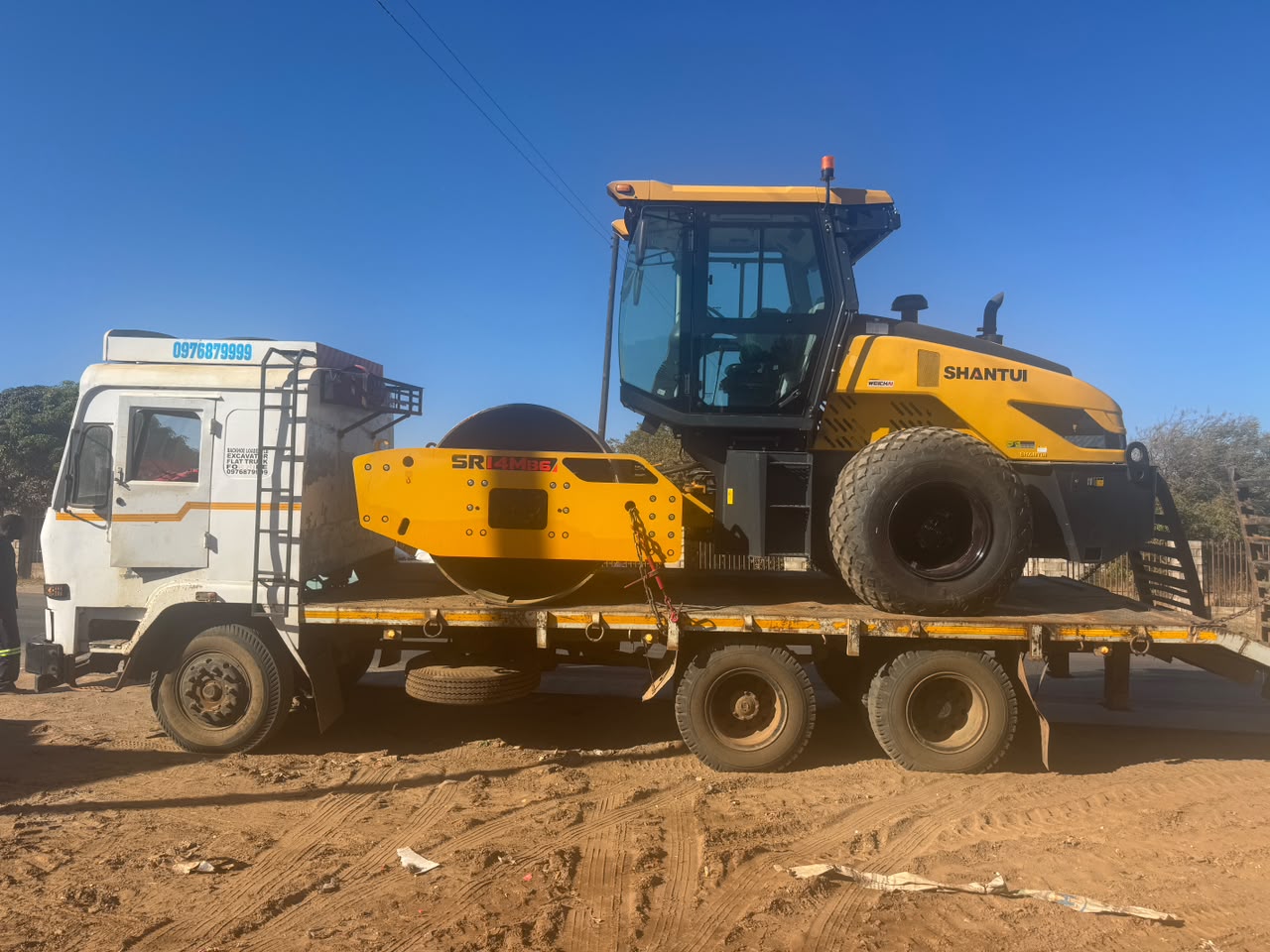 BMR roller compactor on a transport truck
