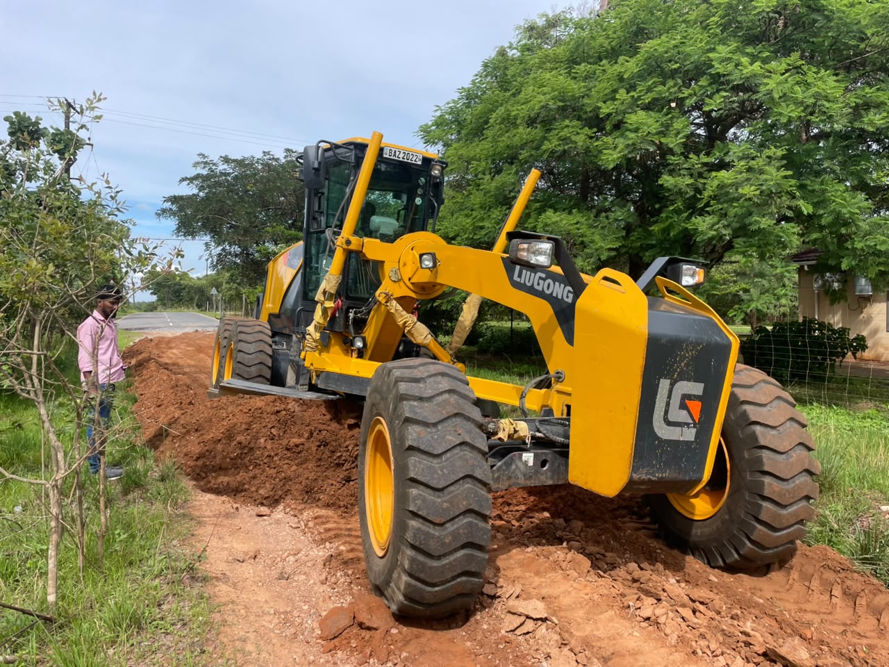 BMR grader cutting a roadside verge
